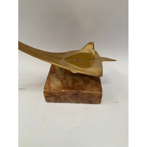 9127 - A stylised brass model of Concorde, upon a plinth base