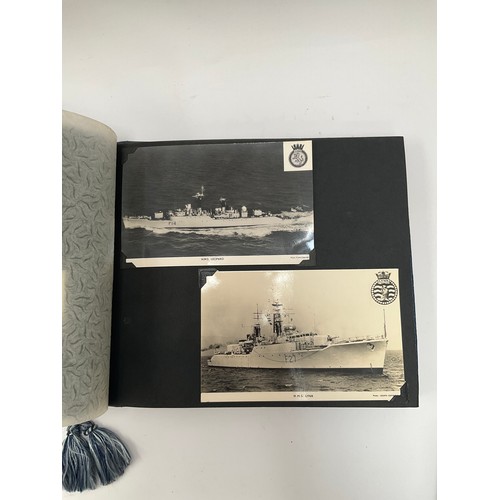 9141 - Three Navy News photograph albums