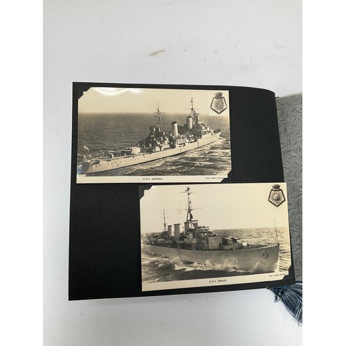 9141 - Three Navy News photograph albums