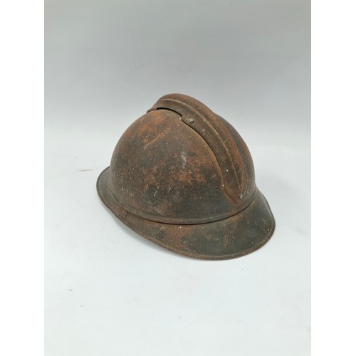 9086 - A WWI French Adrian helmet to the engineers with most of its original paint finish, no lining or chi... 
