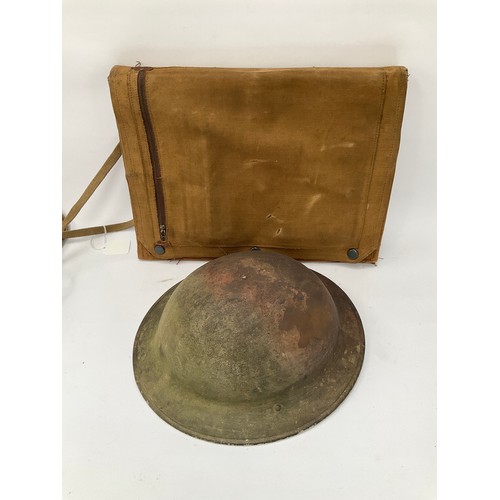 9089 - A WWII British Army helmet with large map case (2)