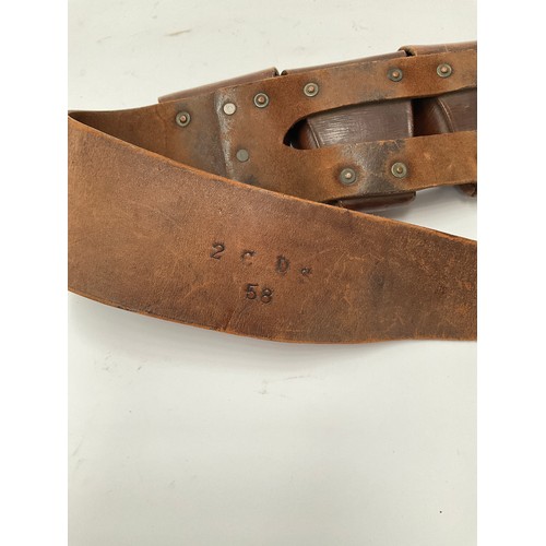 9092 - A WWI five pouch leather bandolier, unit marked