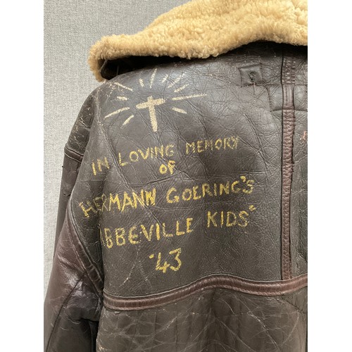 9077 - A WWII B3 sheepskin flying jacket by Perry Sportswear Co., with artwork to back, some wear requiring... 