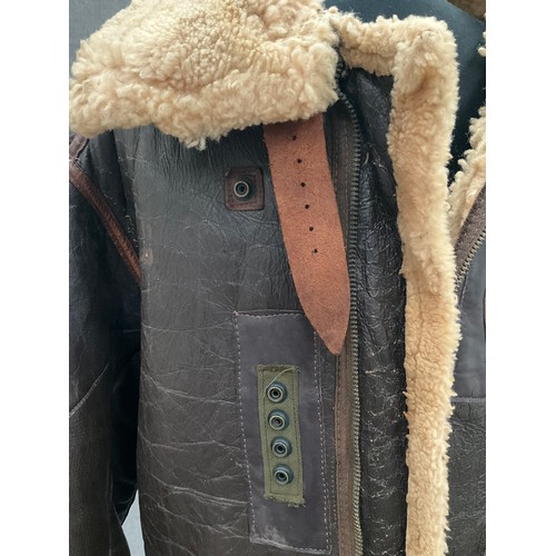 9078 - A WWII B3 sheepskin flying jacket by HLB Corp. New York, with artwork badge to front, size 46, repai... 