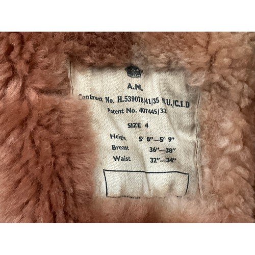 9076 - A WWII British Irvin sheepskin flying jacket, size 4, latch repairs present   (C)