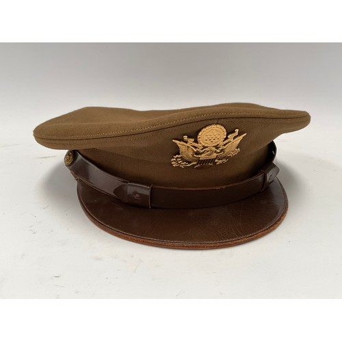 9073 - A WWII USAAF officer's jacket and hat   (C)