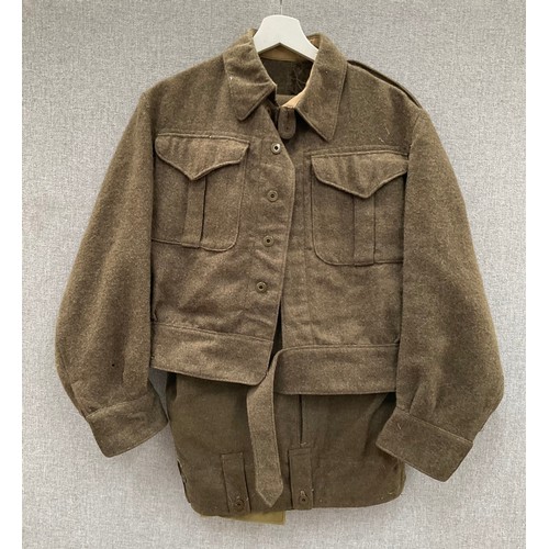 9071 - A WWII 1940 pattern Canadian battledress blouse dated 1944, together with a later pair of battledres... 