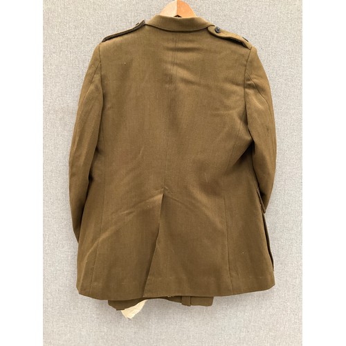 9070 - A British Army Chaplain's service jacket and trousers with insignia and medal bar   (C)