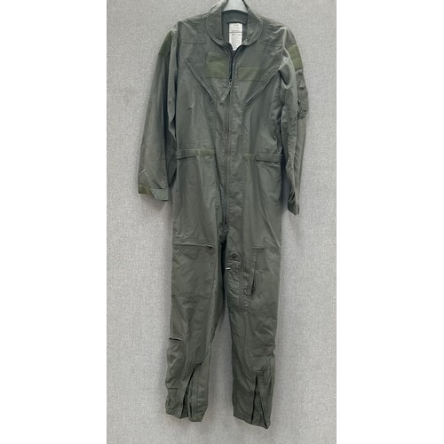 9102 - A large quantity of mixed military uniform including wartime or earlier Royal Navy officer's tunic