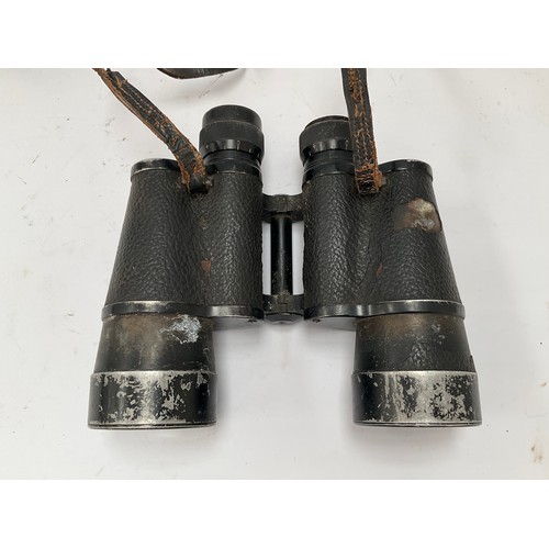 9096 - A pair of Third Reich era German Busch, Rathenow Marluxon 7x50 binoculars, numbered 319055, some dam... 
