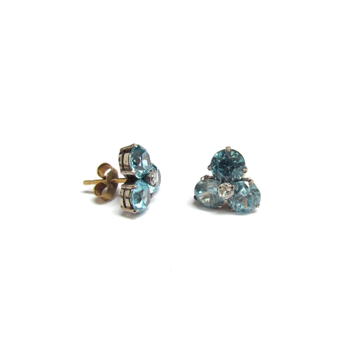 8060 - A pair of topaz and diamond earrings for pierced ears, 3.5g