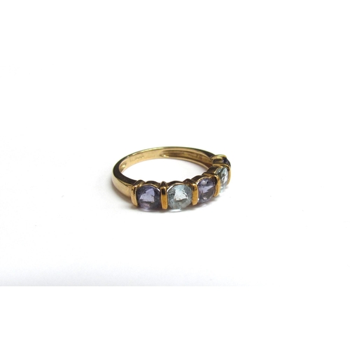 8092 - A 9ct gold aquamarine and tanzanite five stone ring. Size J, 1.7g