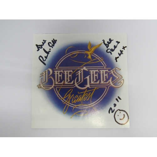 7299 - BEE GEES: 'Bee Gees Greatest' CD, booklet signed in marker pen by Robin Gibb 2011