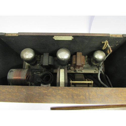 7264 - Two 1920's oak cased valve radios including Brandes Radio example with metal fittings (case a/f) (2)