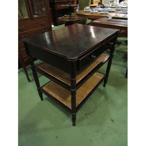 4004 - A Georgian style ebonised mahogany two drawer three tier side table on spiral twist tapering turned ... 