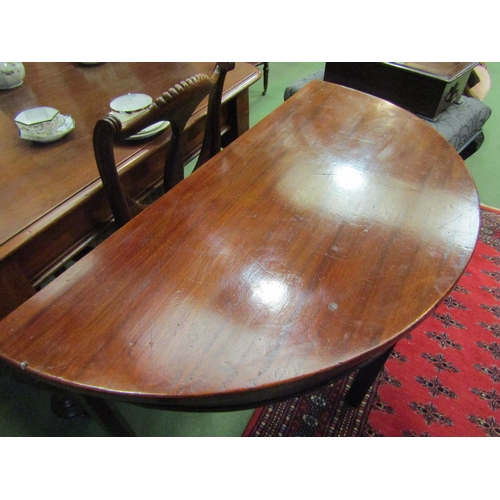 4021 - A George III mahogany demi-lune table on chamfered square leg supports, 72cm tall x 108cm wide x 53c... 