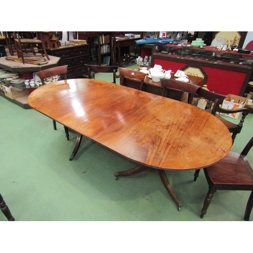 4067 - A Regency mahogany D-end extending dining table, reeded outswept legs to lion paw brass castors, 70c... 