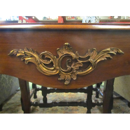 4087 - A Louis XIV walnut and rosewood small writing table, the gilt tooled leather writing surface over sq... 