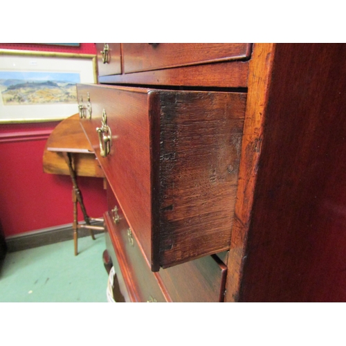 4122 - A circa 1760 mahogany chest on stand of two short over three graduating long drawers with oak lining... 