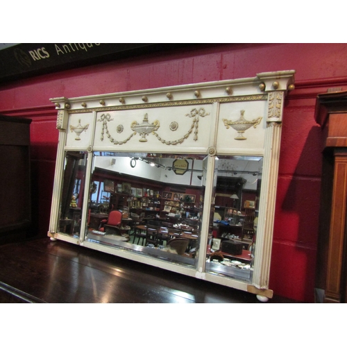 4124 - A Victorian shabby chic three panel overmantel mirror with bevelled glass and swag detail, damaged, ... 