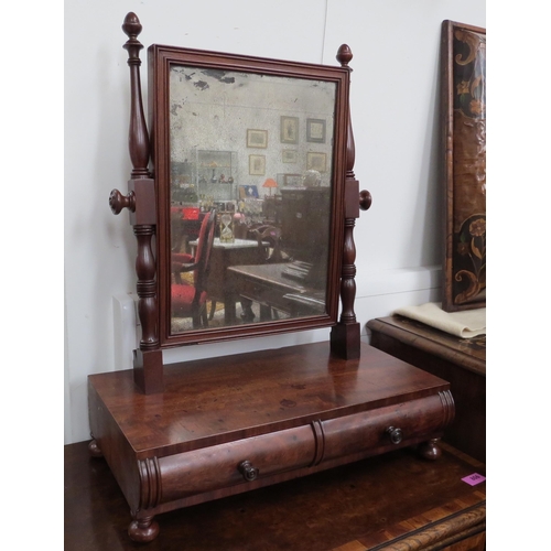 4136 - An early 19th Century flame mahogany dressing chest mirror with turned supports and acorn finials ov... 