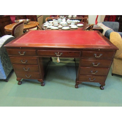 4178 - A George III style mahogany twin pedestal desk, the gilt tooled leather writing surface over brushin... 