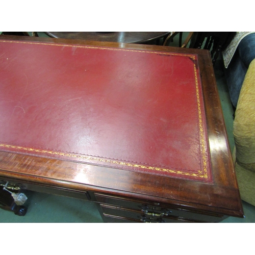 4178 - A George III style mahogany twin pedestal desk, the gilt tooled leather writing surface over brushin... 