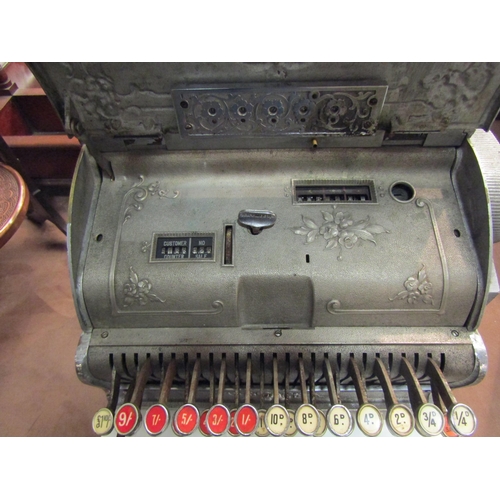 4200 - An NCR National Cash Register, model 348, serial no, 1014531 (date 1911). Nickel-plated case, dogwoo... 