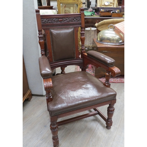 4199 - A Circa 1890 carved and turned walnut armchair with leather upholstery and brass stud borders, 108cm... 