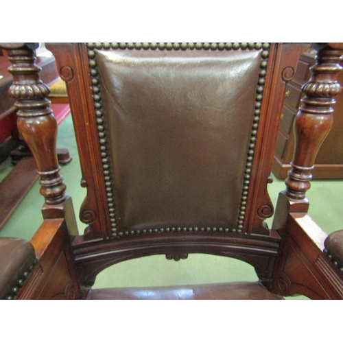 4199 - A Circa 1890 carved and turned walnut armchair with leather upholstery and brass stud borders, 108cm... 