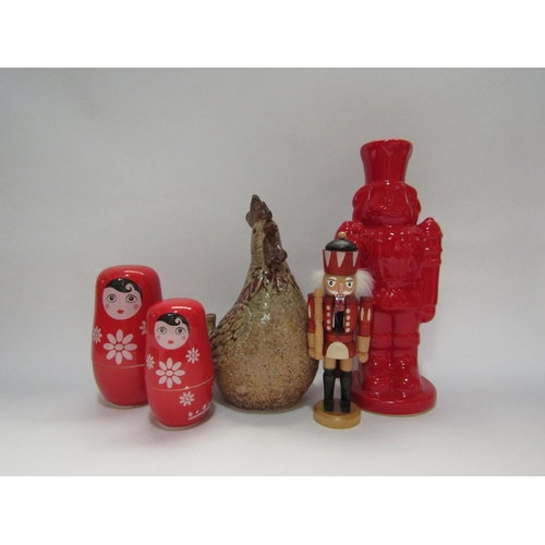 4352 - A red ceramic soldier money box, Russian doll measuring cup set, Studio pottery chicken and soldier ... 