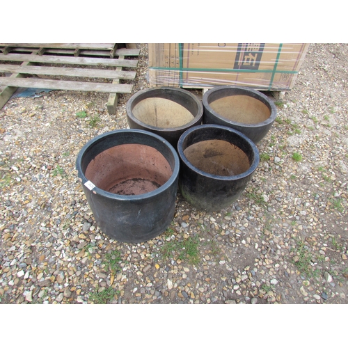 3525 - Four black glazed pots