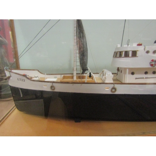 4006 - A scratch built model of a Lowestoft trawler made by former RN sailor William Heffer, in glass displ... 