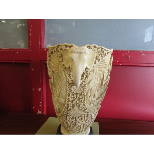 4019 - An Oriental faux ivory resin vase, 30cm tall