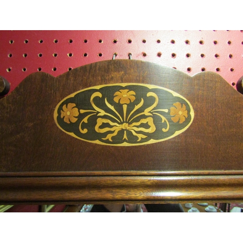 4041 - A mahogany inlaid fret-cut mirror, 66cm x 39cm