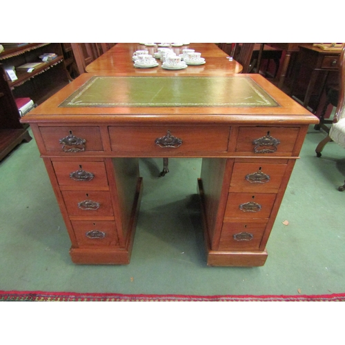 4069 - An early 20th Century twin pedestal desk, nine drawers, green tooled leather insert top, 77cm x 90cm... 