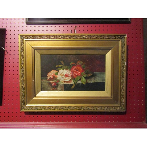 4079 - A still-life oil on board, pink roses, gilt framed, 16.25cm x 28cm image size