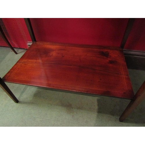 4081 - An Edwardian crossbanded and inlaid mahogany two tier lamp table on square tapering legs, 70cm x 61c... 