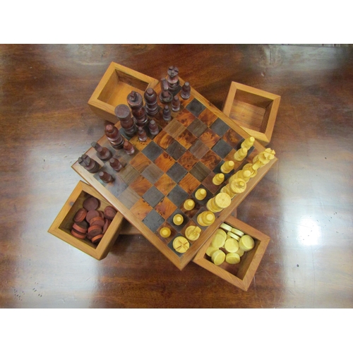 4093 - A wooden chess and draughts set, 18cm x 18cm