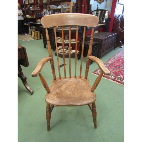 4101 - An elm Windsor chair with stick-back armchair