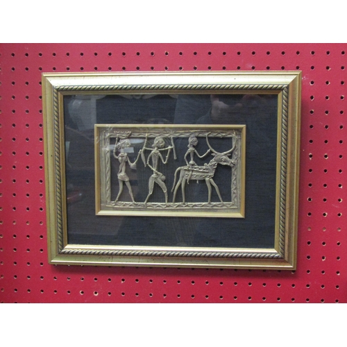 4106 - A brass tribal artwork on silk of African figures, framed and glazed, 13cm x 20cm     (R) £10