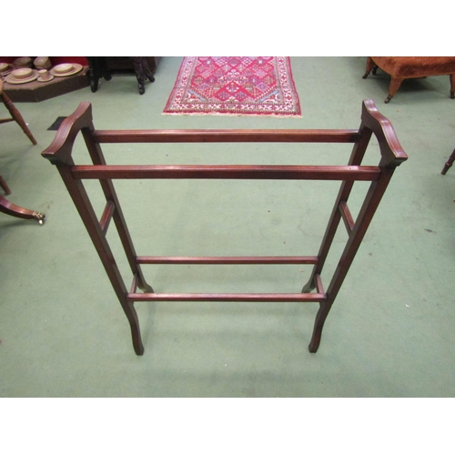 4120 - An Edwardian line inlaid mahogany four-bar towel rail