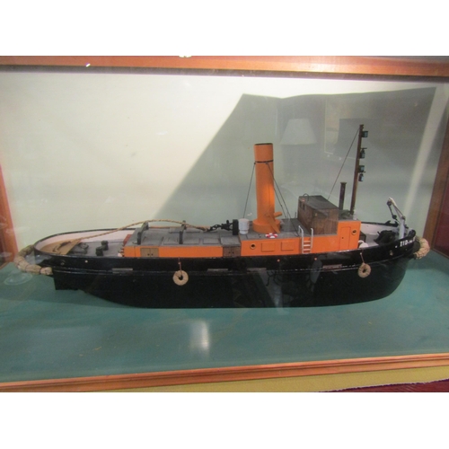 4131 - A scratch built TID 159 Steam Tug model made by former RN sailor William Heffer, in glass display ca... 