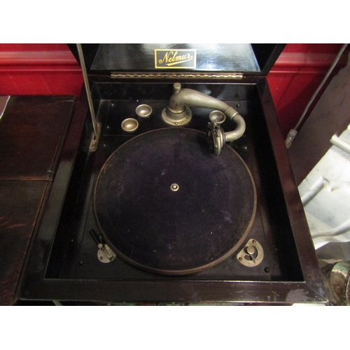 4139 - An Edwardian upright cabinet gramophone with inlaid decoration and winding handle