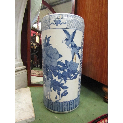 4150 - An Oriental style blue and white umbrella stand, 44cm tall