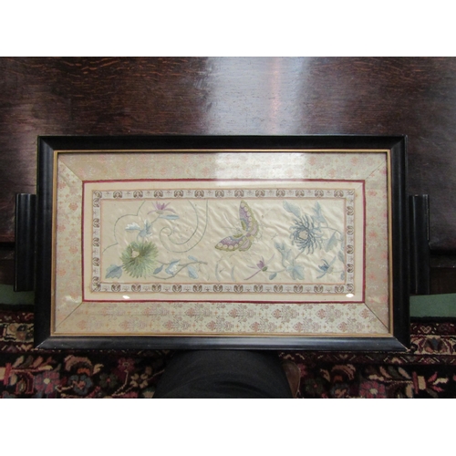 4167 - A framed silk panel set within a tray with Hong Kong retail label verso