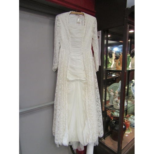 4181 - A 1960's vintage wedding dress, lace with pearl droplet detail           (E) £20-30