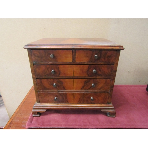 4188 - An apprentice chest of drawers on bracket feet, five drawers, 25cm x 30cm x 21cm