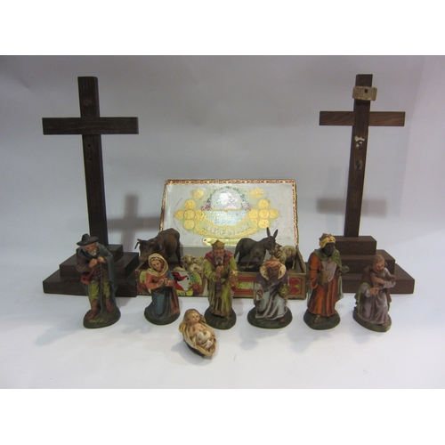 4359 - A collection of religious items; crucifixes, nativity figures, etc