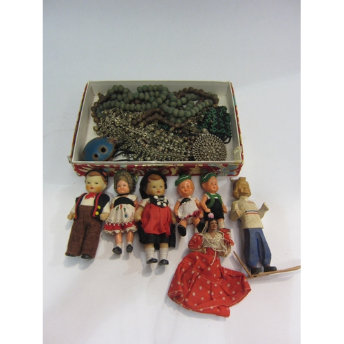 4362 - Ethnic jewellery together with miniature costume dolls  GROUP